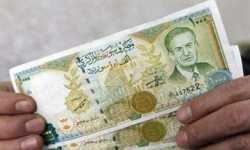 الليرة السورية تواصل انهيارها.. الدولار أصبح قريباً من عتبة الـ (1000)